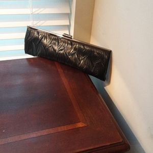 Black and gunmetal clutch